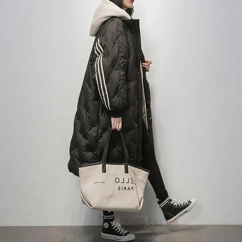 Women's warm hooded winter puffer jacket, elegant design for cold weather outerwear and fashion.