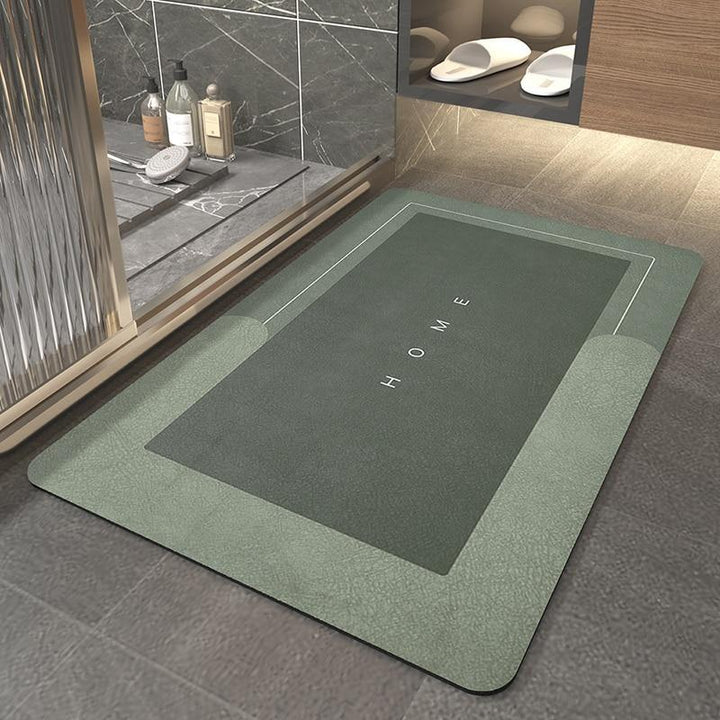 Absorbent, quick-drying bath mat ensures a dry, safe bathroom floor; sleek modern design & easy clean.
