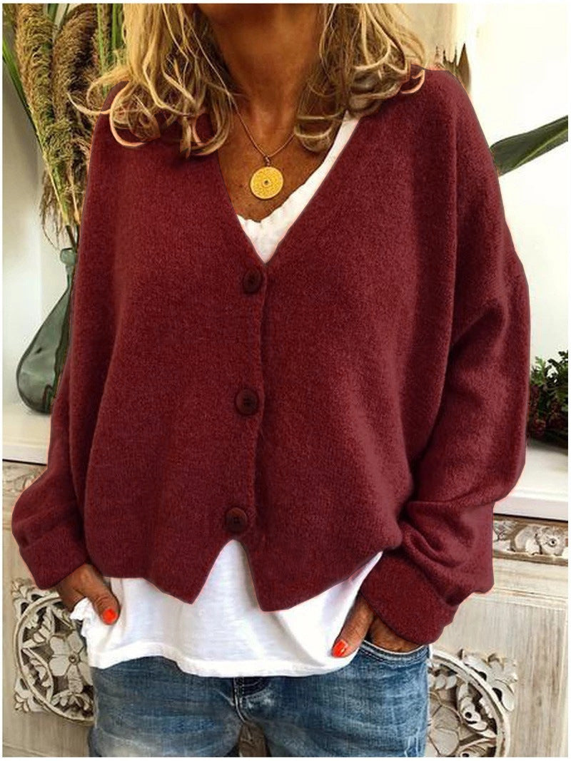 Women's chic knit V-neck cardigan, a perfect button-front outerwear piece for style.