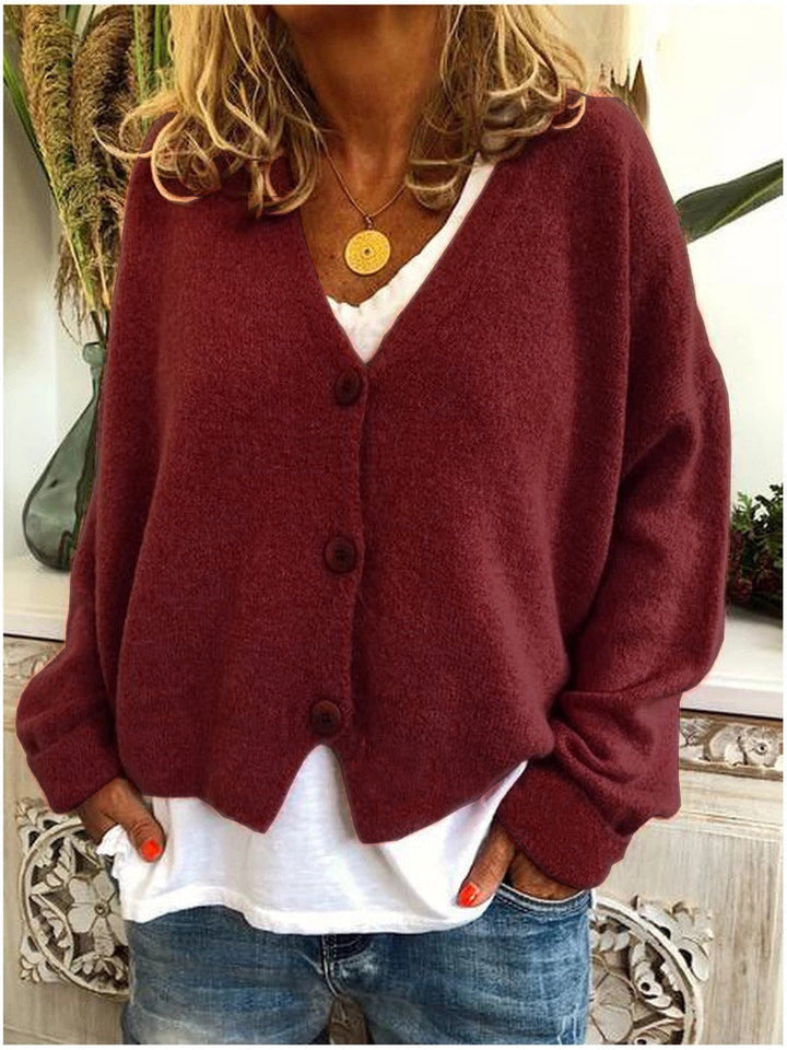 Women's chic knit V-neck cardigan, a perfect button-front outerwear piece for style.