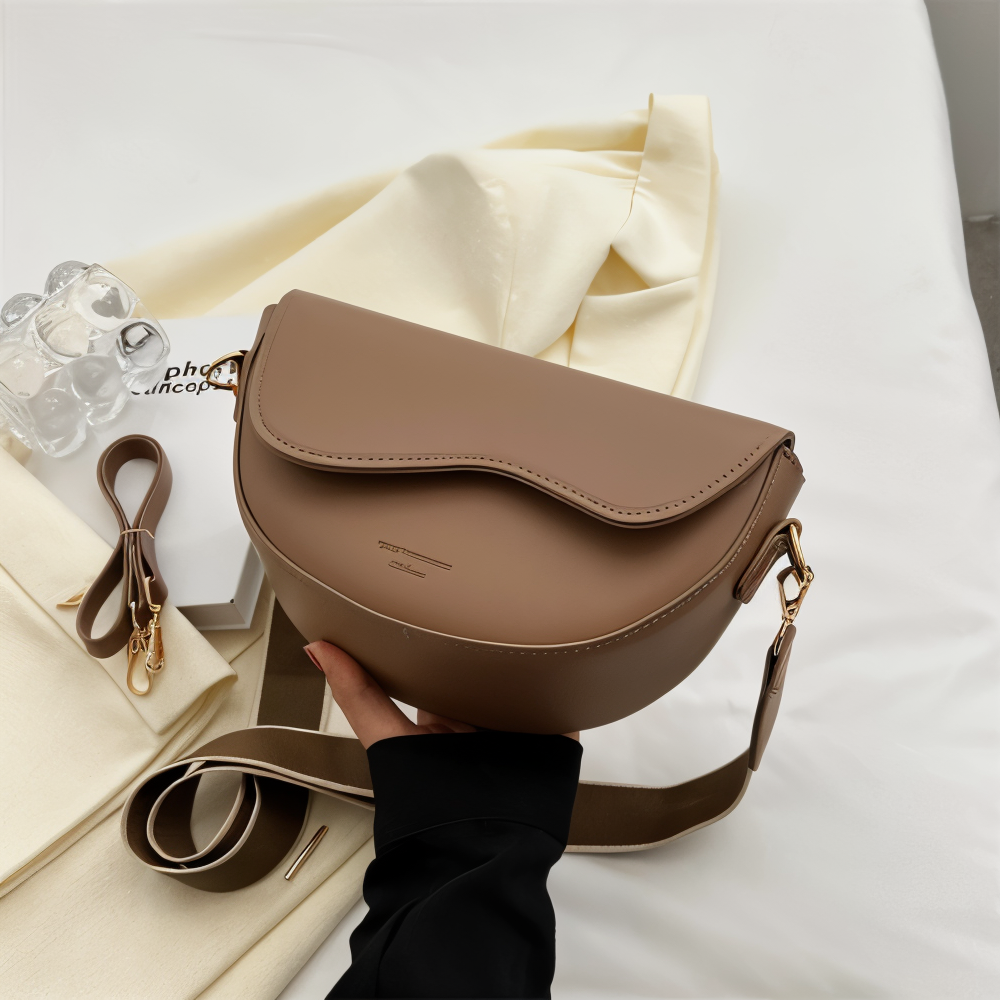 Versatile coffee women's crossbody bag, a chic shoulder bag for daily use & fashion accessory.
