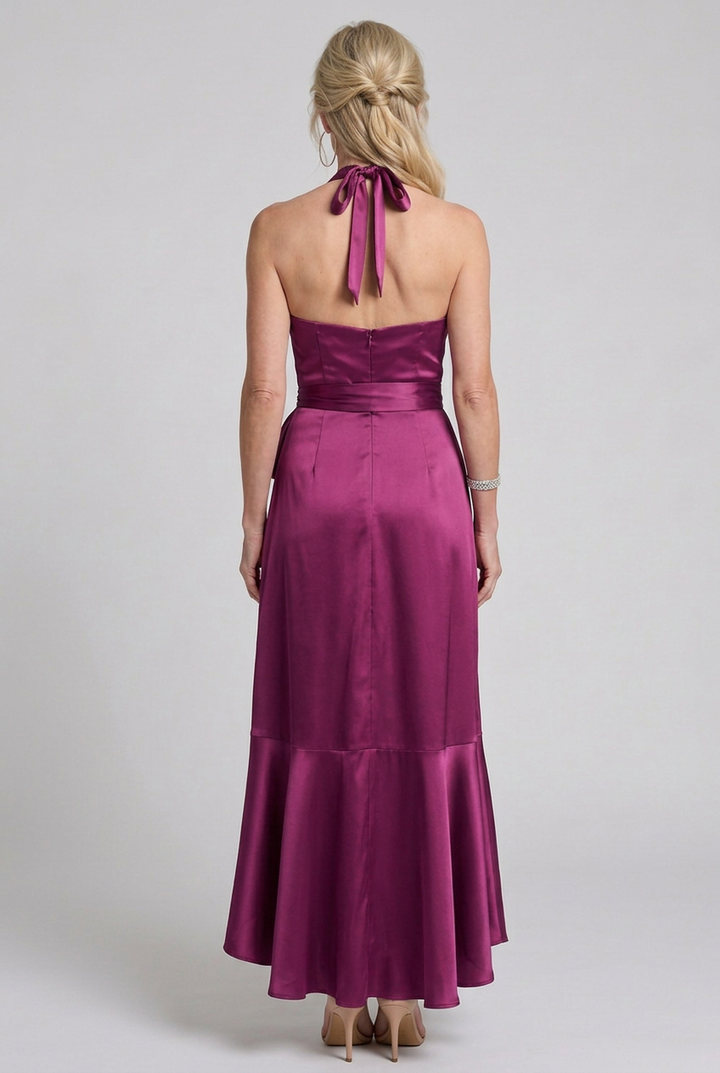Fashionable women's halter neck wrap midi dress with a flattering silhouette & chic asymmetric hem.