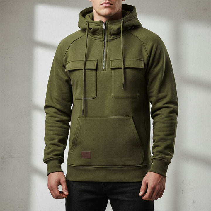 Close-up of the quarter zip & fabric detail on a comfortable men's hooded sweatshirt, great for cozy comfort.