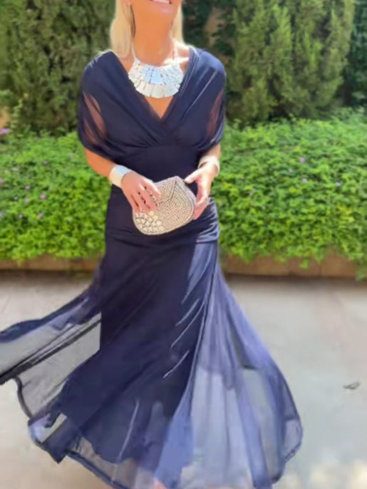 Chic women's V-neck floral maxi dress, an elegant summer party dress with a flowy silhouette.