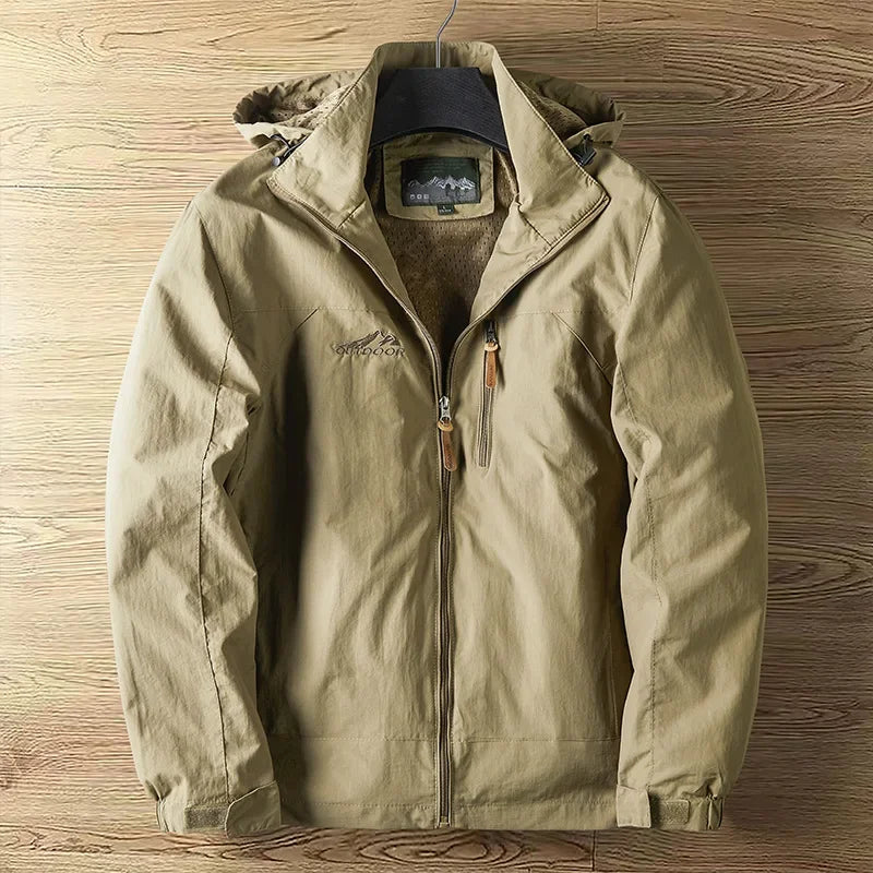 Men's lightweight waterproof hooded jacket. Essential outerwear for rain, wind, and outdoor travel.