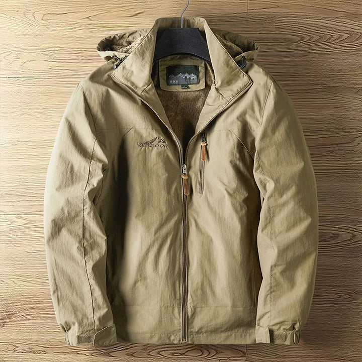 Men's lightweight waterproof hooded jacket. Essential outerwear for rain, wind, and outdoor travel.