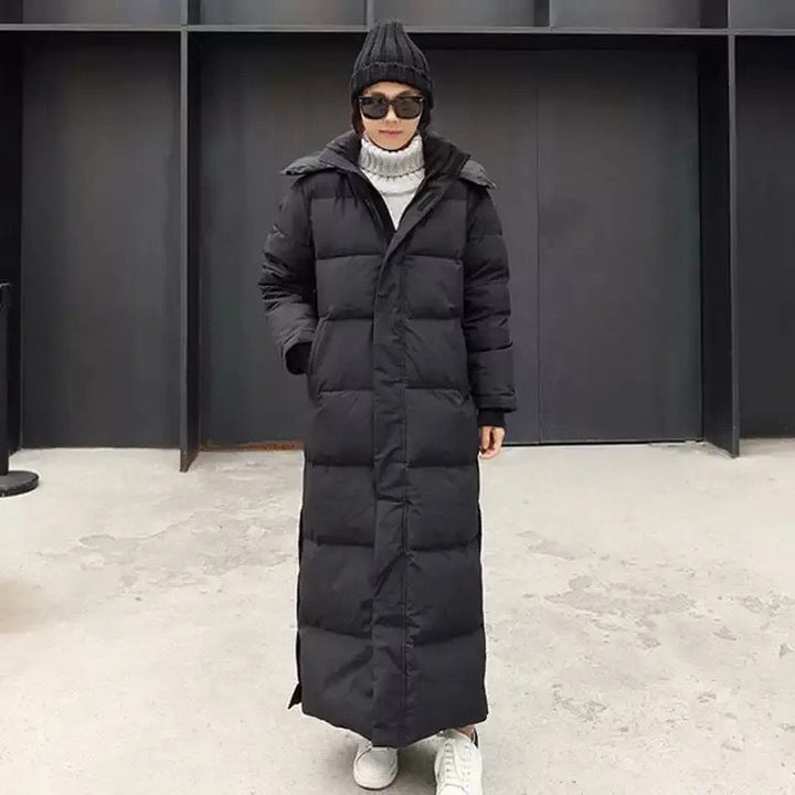 Fashionable women's long padded winter jacket. Hooded, zippered, and warm for ultimate cold weather comfort.
