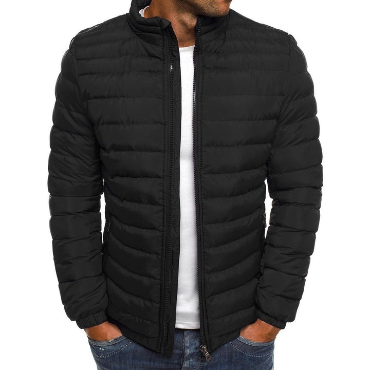 Men's lightweight slim puffer jacket in black, ideal for winter & fall. Stylish zip-up outerwear.