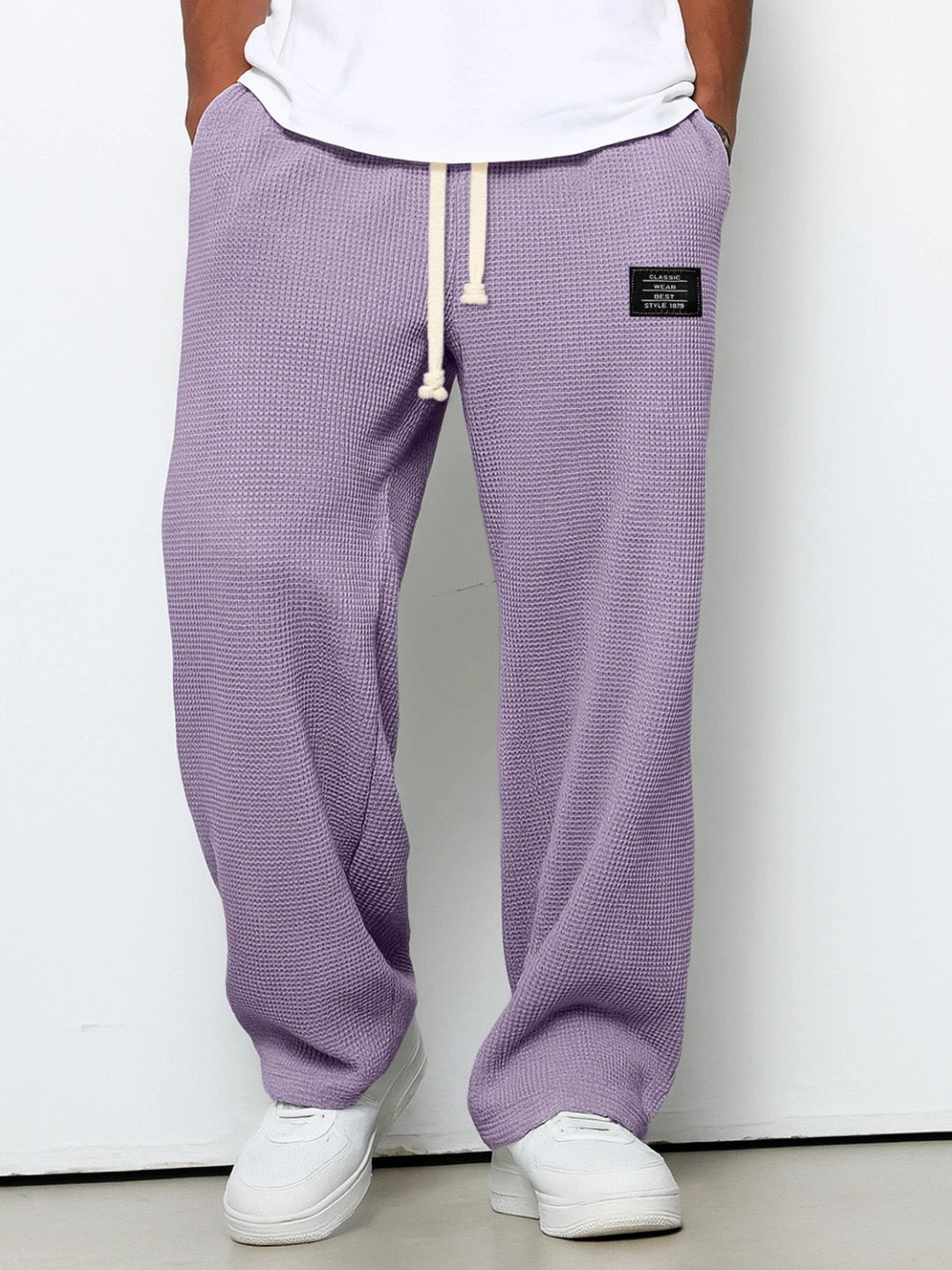 Classic men's everyday trousers, offering versatile relaxed straight fit for various casual fashion styles.