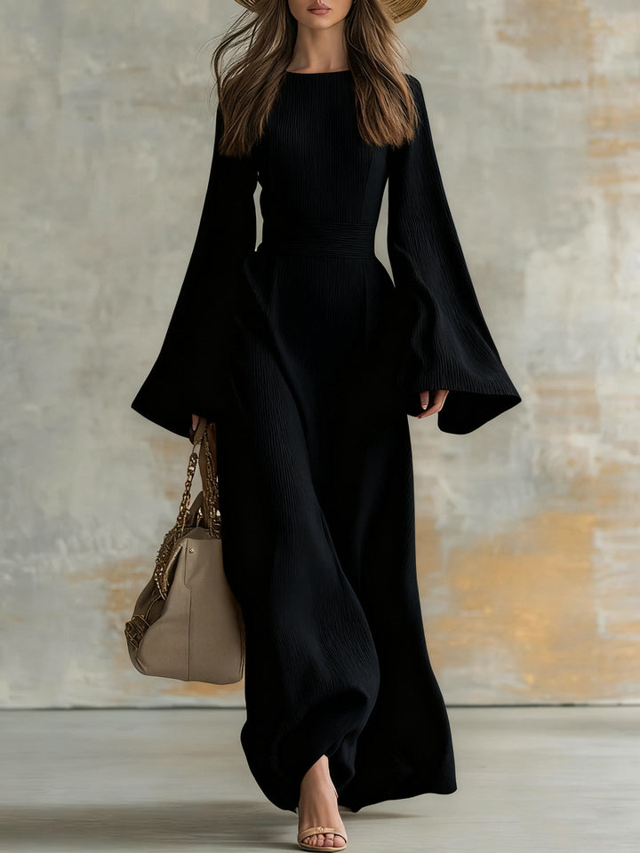 Elegant black long-sleeve evening maxi dress for women. Perfect timeless formal gown for special occasions.