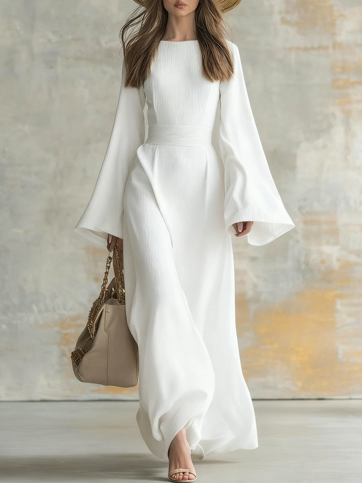 Women's elegant black maxi dress. Timeless long-sleeve formal gown, perfect for sophisticated evening fashion.