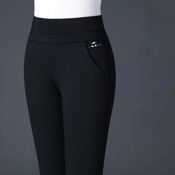 Stylish women's athleisure stretchy pants in a flattering gray, offering comfort for active women and everyday fashion.