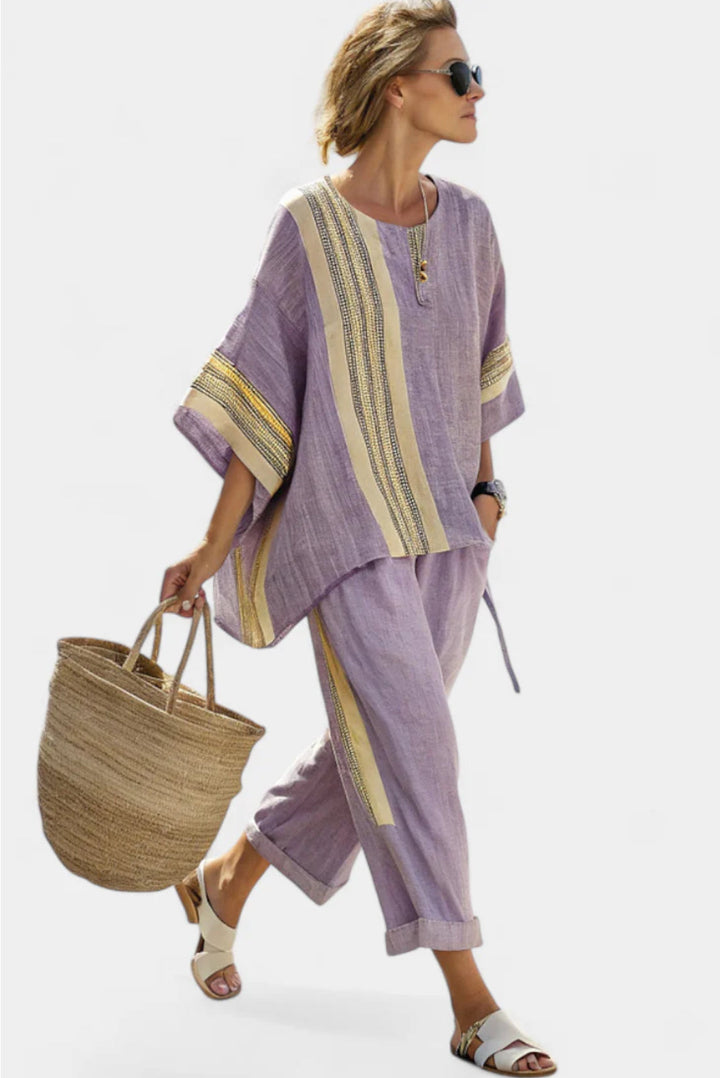 Women's elegant striped top and wide-leg pants set, a chic and comfortable two-piece co-ord for any occasion.