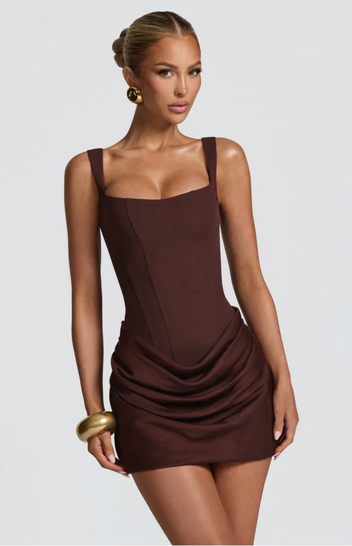 Elegant women's tailored mini dress featuring a flattering sculpted corset for special occasions.