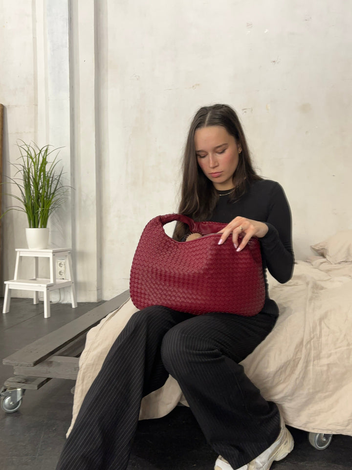 Modern chic one shoulder bag. Vegan leather women's fashion accessory.