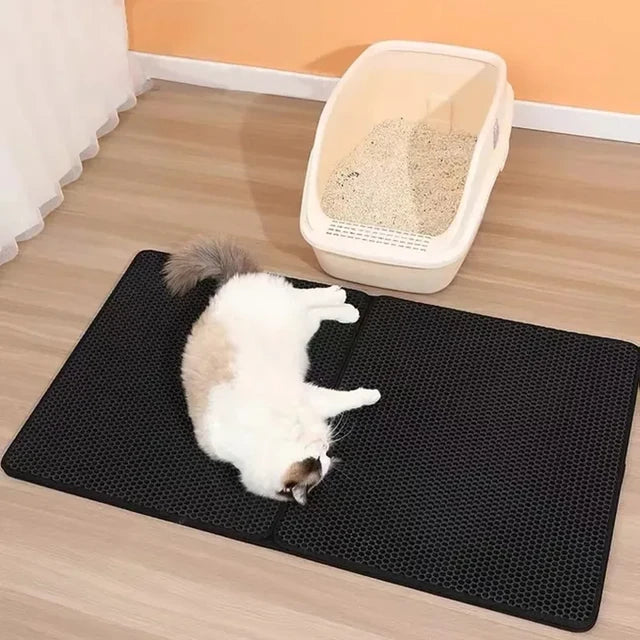 Pet Care Cat Litter Mat: Traps litter, cleans paws, keeps floors tidy. Durable, non-slip, waterproof cat accessory.