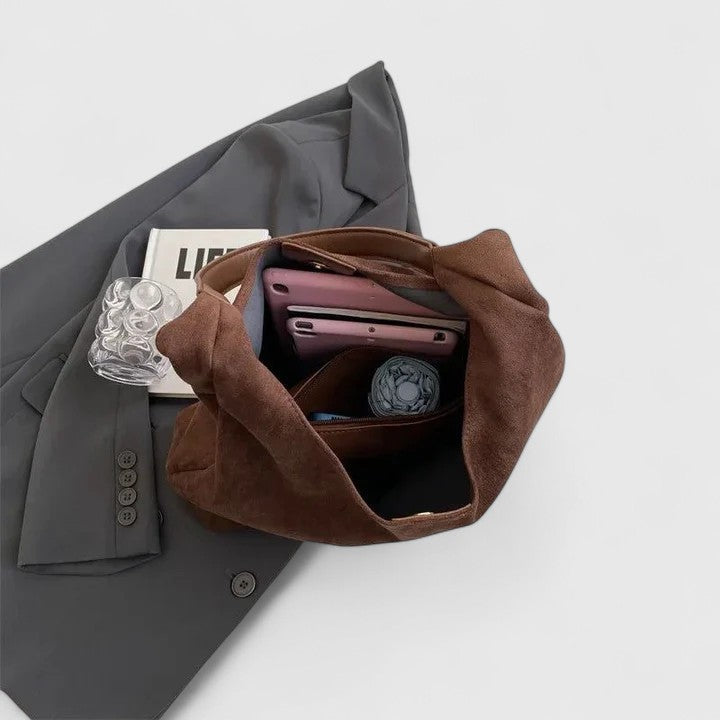Contemporary women's chic tote bag, a spacious everyday shoulder bag, perfect carry-all fashion accessory.