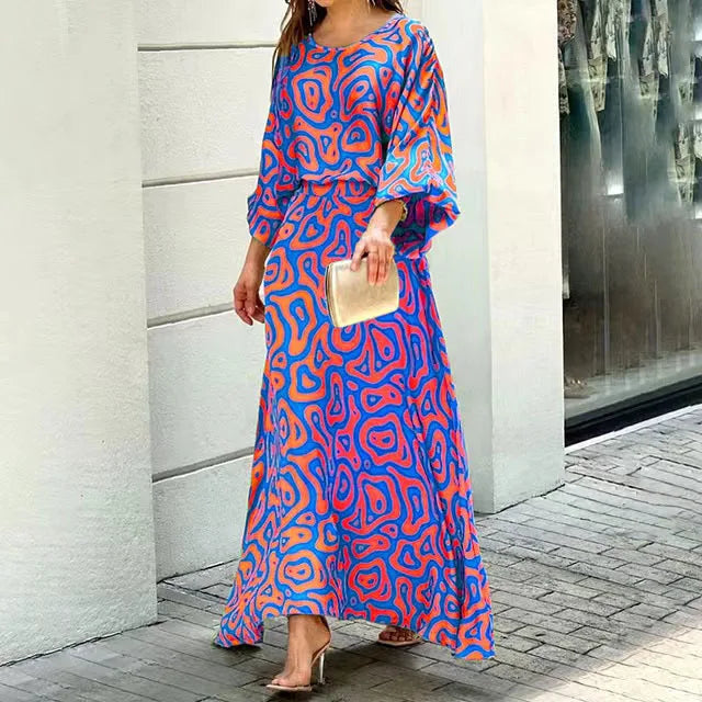 Flattering women's elegant flowy maxi dress, suitable for all occasions. Vibrant summer evening party wear.