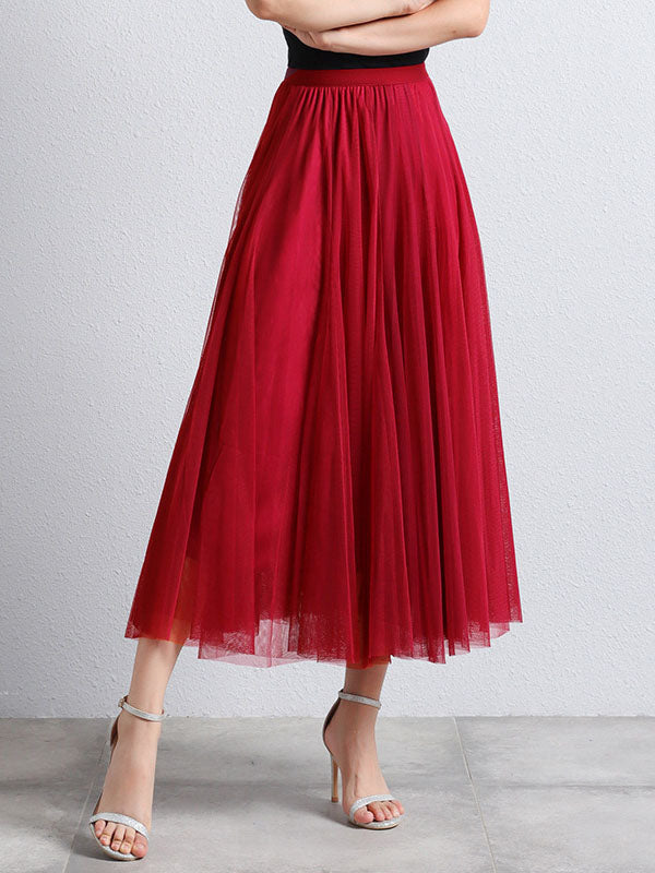 Elegant women's midi tutu skirt with a flowing, puffy trapeze silhouette, perfect for spring/summer.