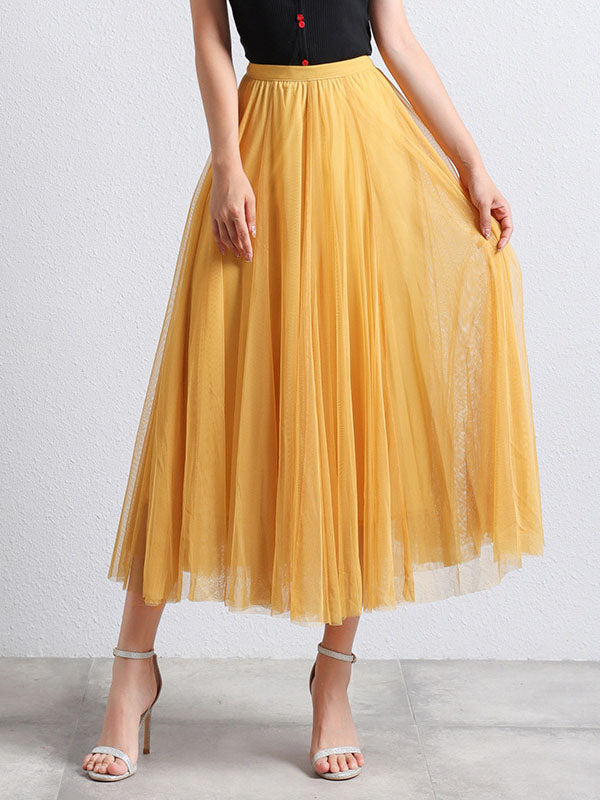 Puffy trapeze tutu skirt for women, offering a flowing and comfortable midi length, ideal for autumn.