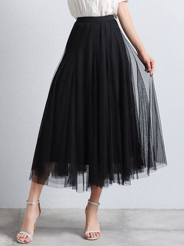 Solid color women's flowing midi tutu skirt, puffier trapeze design, creates an elegant casual look.