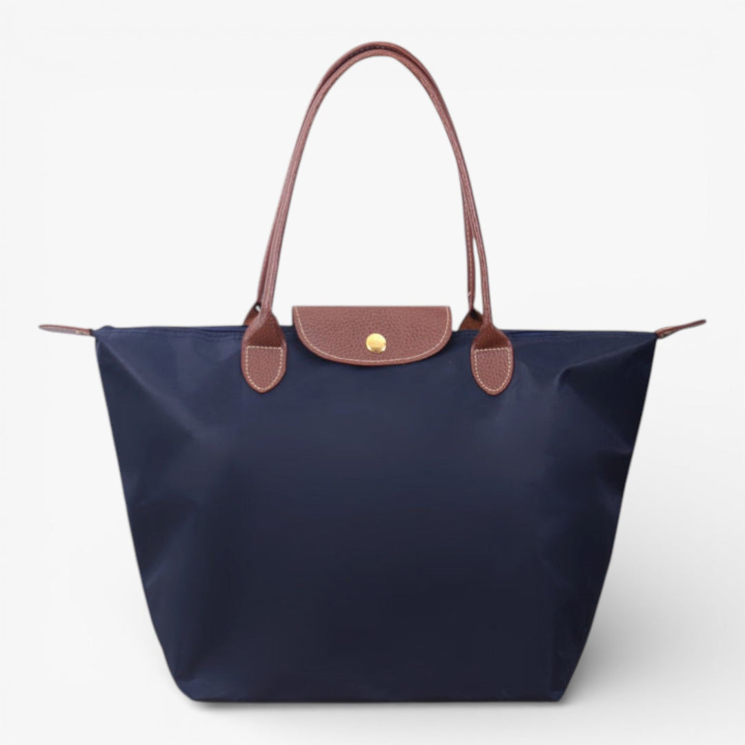 Everyday women's shoulder bag: spacious, stylish, & secure with zip closure. Perfect fashion accessory.