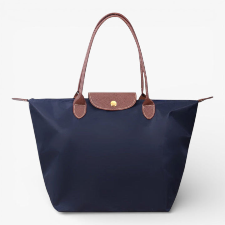 Everyday women's shoulder bag: spacious, stylish, & secure with zip closure. Perfect fashion accessory.