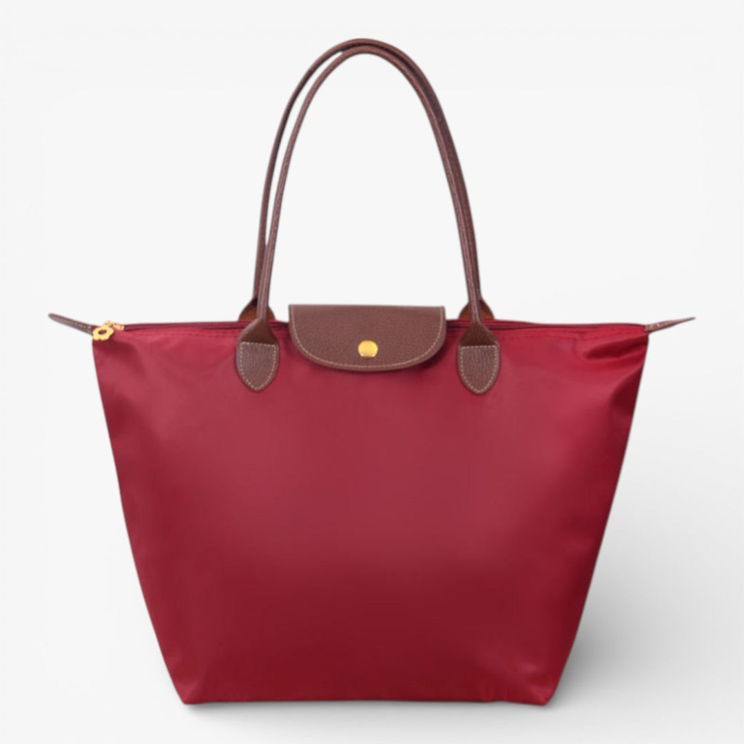 Modern women's shoulder bag, secure zip closure. Spacious everyday handbag, a stylish & organized fashion accessory.