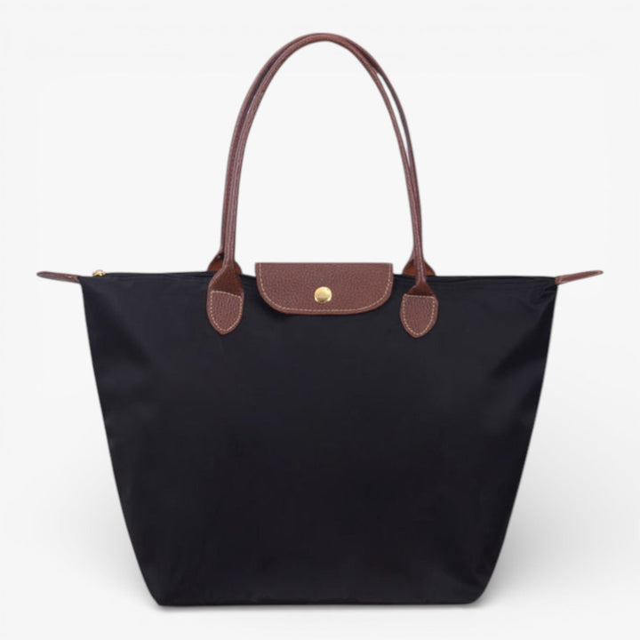 Luxurious women's shoulder bag with secure zip closure. Stylish & spacious everyday handbag for fashion.