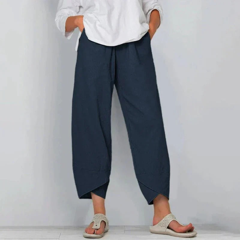 Stylish women's balloon pants featuring a modern tulip hem and elastic waist. Versatile bottoms for daily wear.