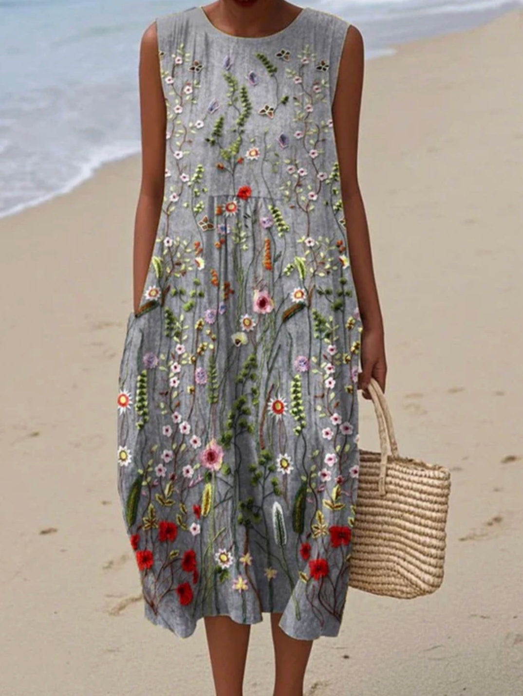 Stylish women's sleeveless summer midi dress, great for vacation and warm weather comfort.