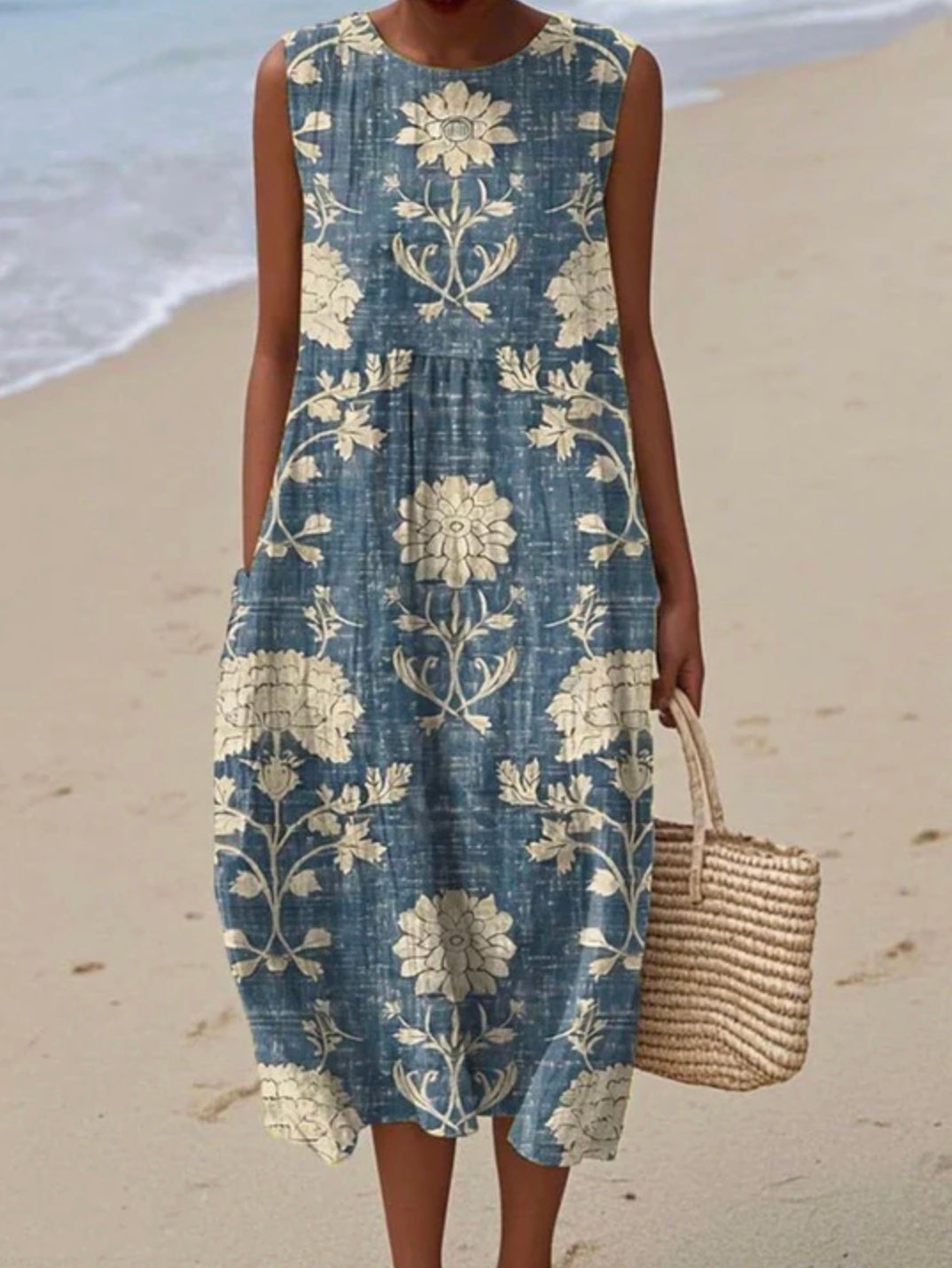Breathable women's sleeveless midi dress, a comfortable & essential piece for summer fashion.