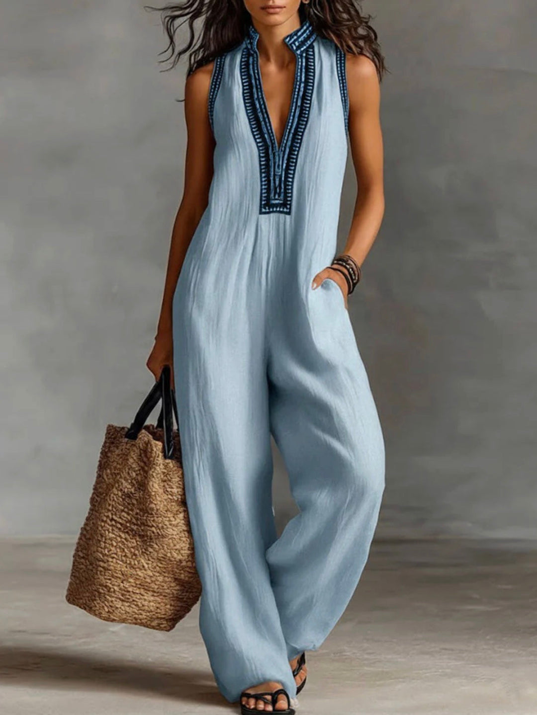 Elegant women's high-neck sleeveless jumpsuit, perfect for modern casual chic or versatile spring/summer outfits.