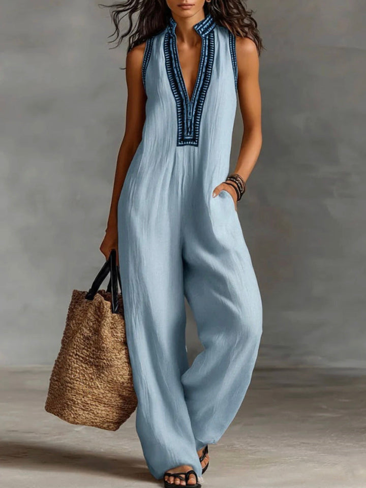 Elegant women's high-neck sleeveless jumpsuit, perfect for modern casual chic or versatile spring/summer outfits.