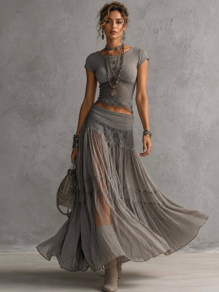 Elegant women's grey lace co-ord set. Stylish two-piece matching outfit perfect for evening wear or chic events.