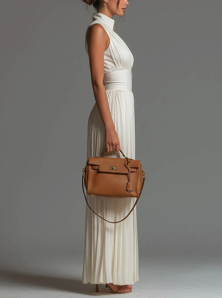 Women's V-neck sleeveless pleated wide-leg jumpsuit, an elegant and contemporary piece for special occasions.