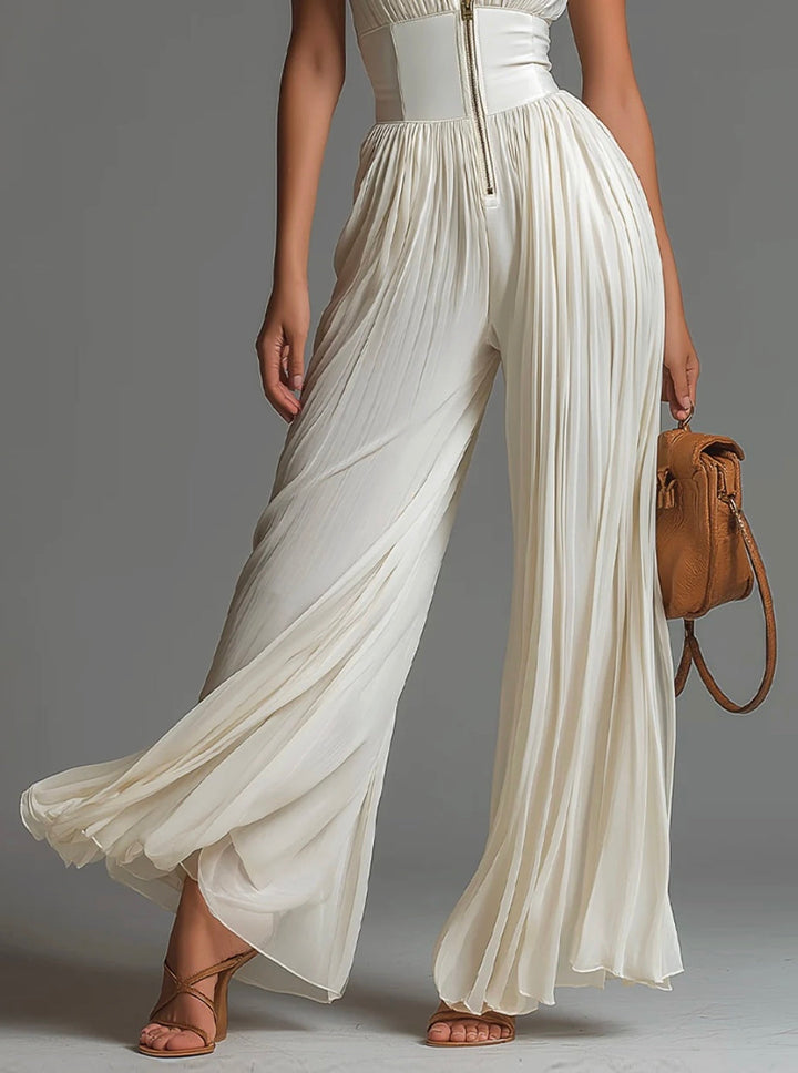 Comfortable & elegant women's V-neck sleeveless jumpsuit, featuring a stylish wide-leg and flattering pleats.