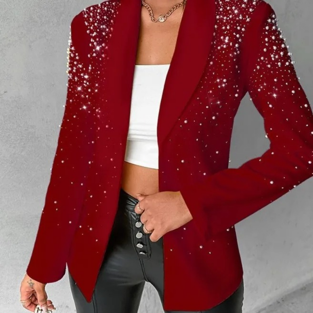 Elegant women's slim-fit blazer, detailed with delicate pearl embellishments, enhancing any formal outfit.