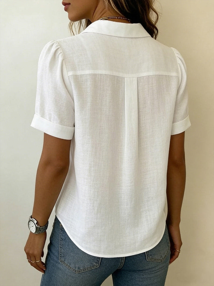 Women's breezy short-sleeve blouse. Comfortable summer top, perfect for effortless casual and office styles.