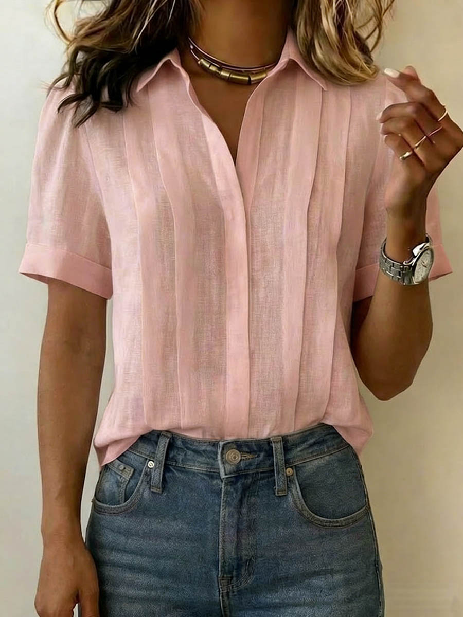 Comfortable women's short-sleeve top. Breezy summer blouse, versatile for casual or classic everyday style.