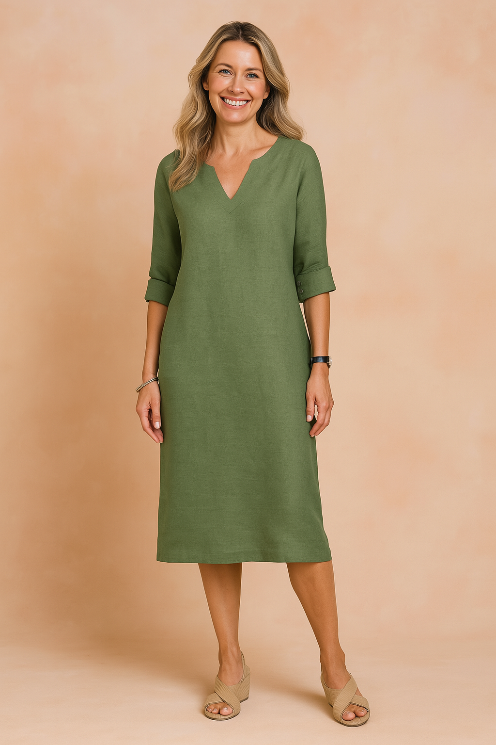 Relaxed fit women's V-neck shift dress, knee-length, 3/4 sleeves, great for spring/summer fashion.