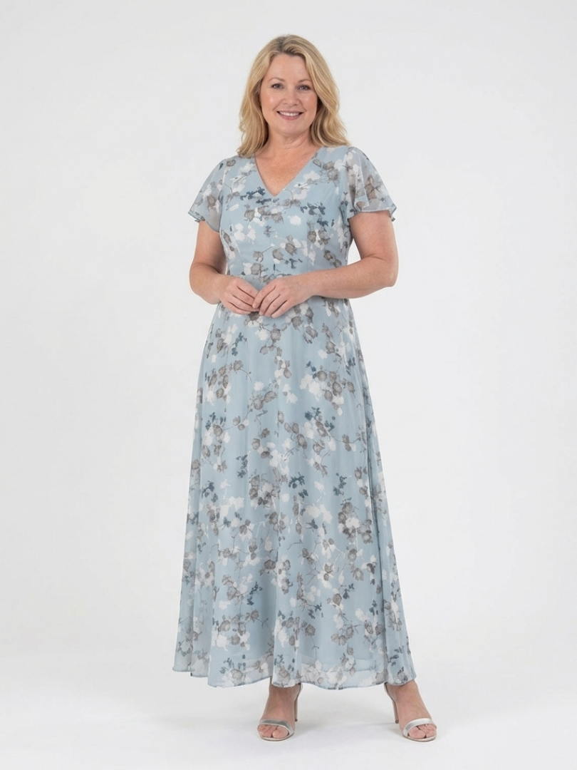 Comfortable women's floral maxi dress. Relaxed fit, flutter sleeves. Ideal for casual or elegant occasions.