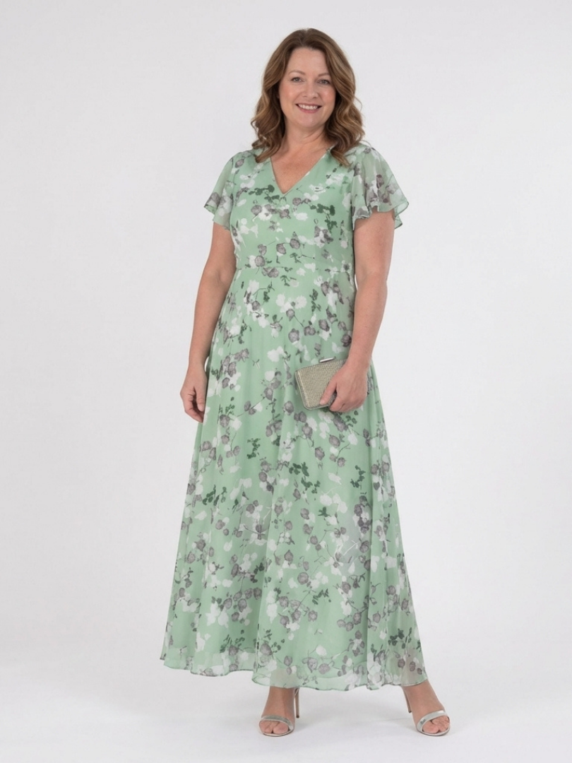 Relaxed fit women's floral maxi dress. Comfortable, elegant, with beautiful flutter sleeves. Great for summer.