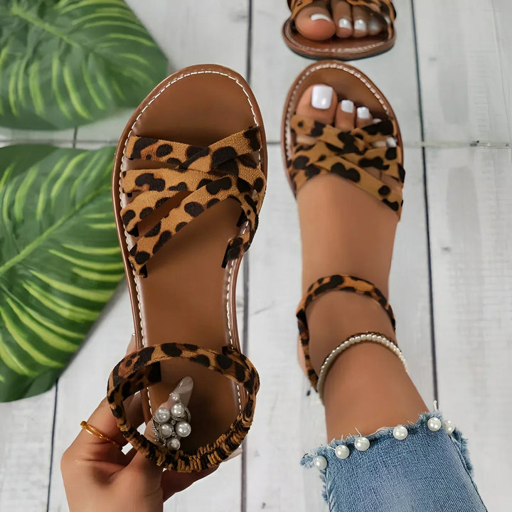 Women's fashion animal print summer flats. Comfortable slip-on shoes featuring a chic leopard or zebra pattern.