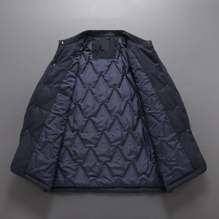 Stylish men's quilted jacket with waterproof finish, perfect for fall & winter fashion. Versatile transition outerwear.