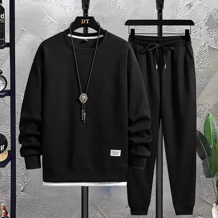 Versatile men's relaxed fit tracksuit. Perfect comfort wear for active days, loungewear, or casual outings.