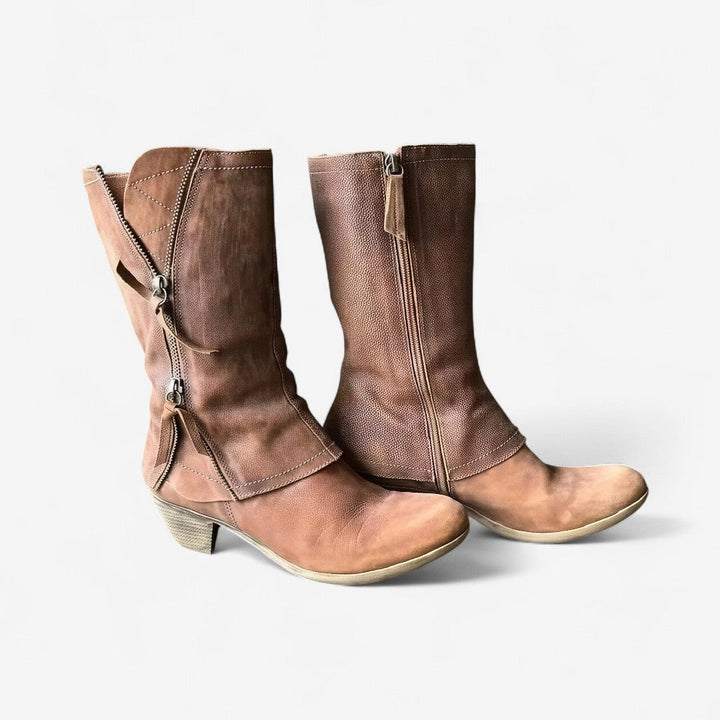 Brown women's mid-calf boots with side zip and block heel. Elegant & versatile fall/winter footwear.