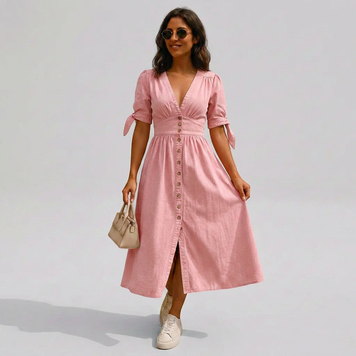 Stylish women's midi dress featuring a V-neck, button-front, and trendy tie-sleeves for casual or elegant spring/summer.