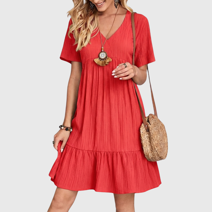 Comfortable & versatile short sleeve midi dress for women. Ideal for various occasions, offering a chic & flattering look.