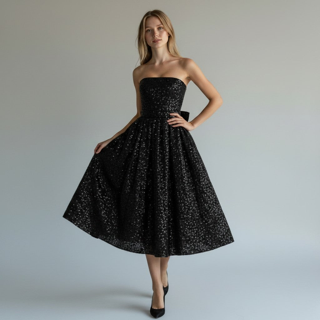 Elegant women's sequin midi dress with a flowing silhouette, perfect for evening wear & special occasions.